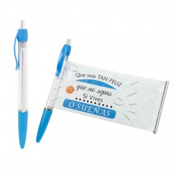 Bolígrafo azul con un mensaje enrollado de felicidad
