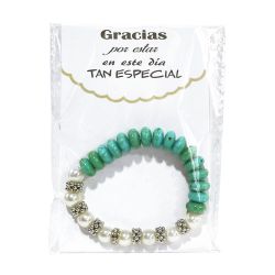 Pulsera de perlas y piedras azules en bolsa de celofán