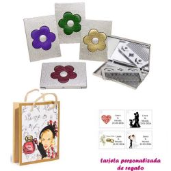 Espejo plateado con una flor grande, y con un peine en el interior, con dibujos de mujer, perfume y belleza, y tarjeta personali