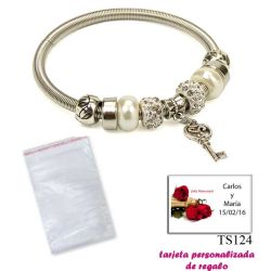 Pulsera con perlas, abalorios y brillantes y colgante con llave corazón