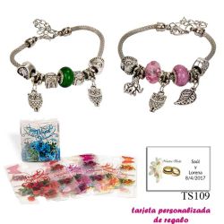 Pulsera con abalorios en colores surtidos (verde o rosa) y colgantes de búhos y elefantes