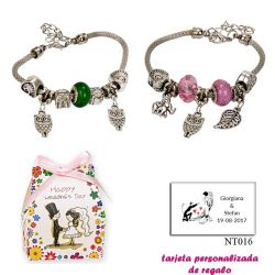 Pulsera con abalorios en colores surtidos (verde o rosa) y colgantes de búhos y elefantes
