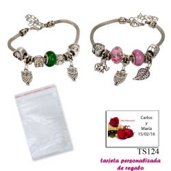 Pulsera con abalorios en colores surtidos (verde o rosa) y colgantes de búhos y elefantes