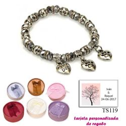 Pulsera My Dog con 3 colgantes de corazon y motivos de huella de perritos