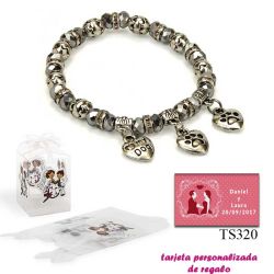 Pulsera My Dog con 3 colgantes de corazon y motivos de huella de perritos