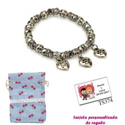 Pulsera My Dog con 3 colgantes de corazon y motivos de huella de perritos