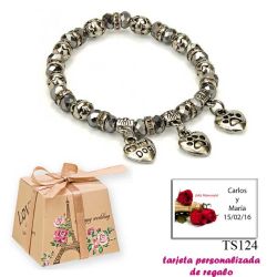 Pulsera My Dog con 3 colgantes de corazon y motivos de huella de perritos
