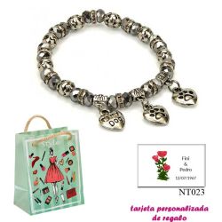 Pulsera My Dog con 3 colgantes de corazon y motivos de huella de perritos