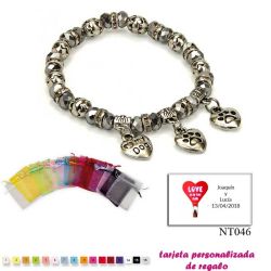 Pulsera My Dog con 3 colgantes de corazon y motivos de huella de perritos