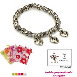 Pulsera My Dog con 3 colgantes de corazon y motivos de huella de perritos