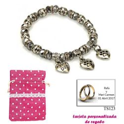 Pulsera My Dog con 3 colgantes de corazon y motivos de huella de perritos