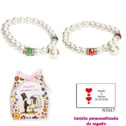Pulsera de perlas blancas con piedras de colores surtidos en rojo o verde