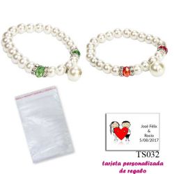 Pulsera de perlas blancas con piedras de colores surtidos en rojo o verde