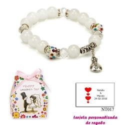 Pulsera de perlas blancas con brillantes de colores y saco de dólar