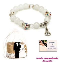 Pulsera de perlas blancas con brillantes de colores y saco de dólar