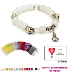 Pulsera de perlas blancas con brillantes de colores y saco de dólar