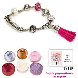 Pulsera de abalorios con detalles en fucsia y borla colgante