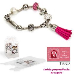 Pulsera de abalorios con detalles en fucsia y borla colgante