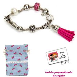 Pulsera de abalorios con detalles en fucsia y borla colgante