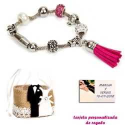 Pulsera de abalorios con detalles en fucsia y borla colgante