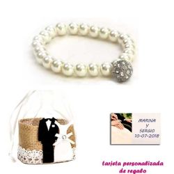 Pulsera de perlas blancas con una bola de brillantes