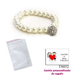 Pulsera de perlas blancas con una bola de brillantes